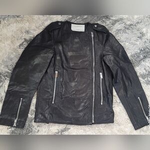Zara Women's Black Leather Jacket with Silver Accents